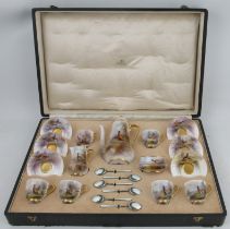 A boxed Royal Worcester coffee set, consisting of six coffee cans and saucers, a coffee pot, a