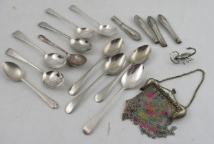 A collection of assorted silver spoons, including Georgian examples, together with a mesh purse