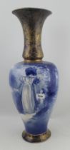 A large Royal Doulton vase, of baluster form, decorated in blue with a woman and child, height