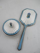 A silver and guilloche enamel mounted dressing table mirror and matching powder bowl