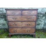 A Georgian mahogany chest, of two short drawers over three graduated long drawers, raised on bracket