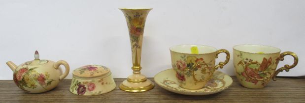 Two Royal Worcester blush ivory cups, and a saucer, miniature tea pot, patch box and cover and