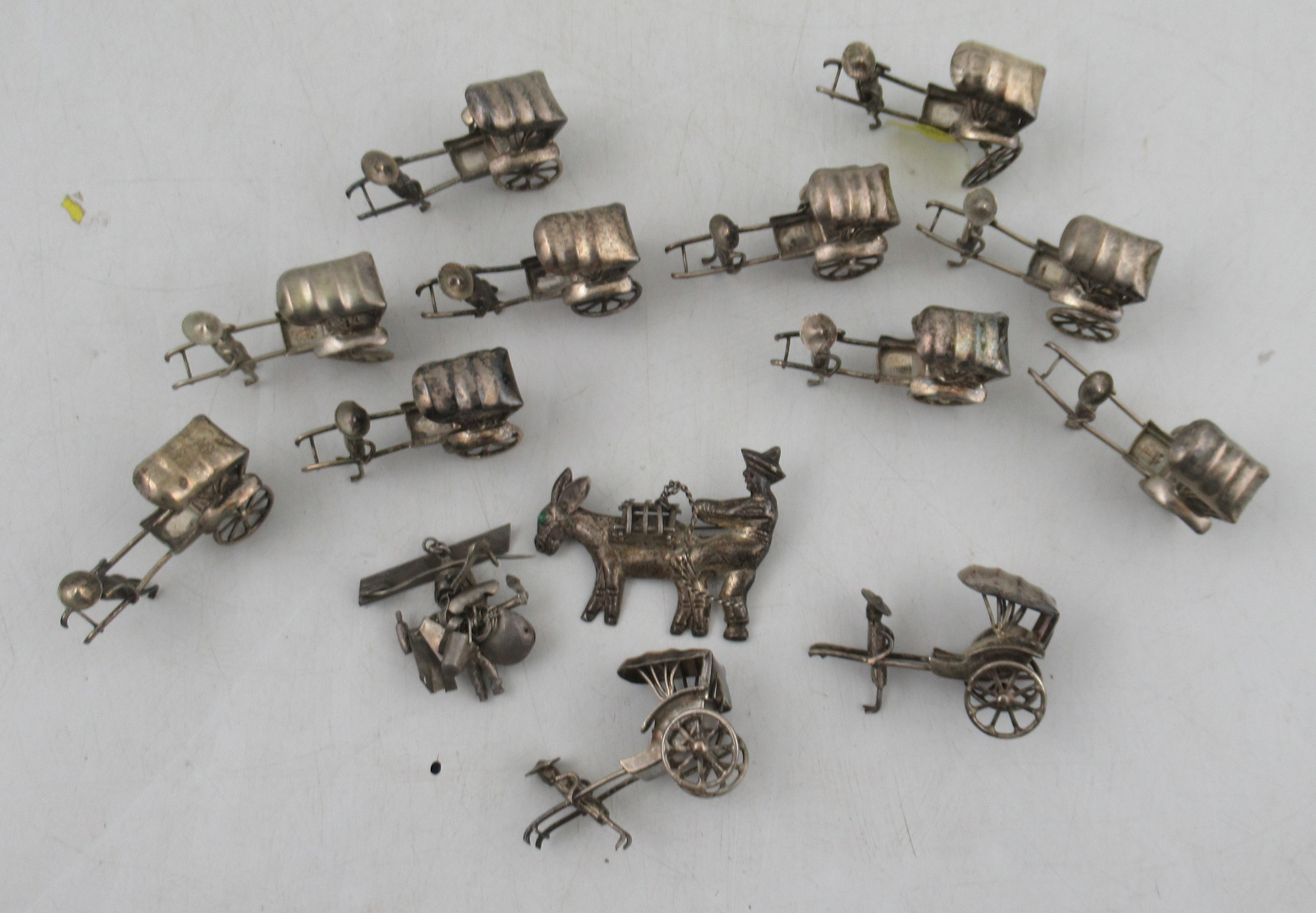 Twelve various white metal miniature Rickshaws with figures, together with a Mexican '925' silver - Image 2 of 4