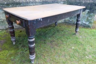 A 19th century pine scrub top kitchen table, fitted with frieze drawer, 61ins x 36ins