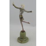 An Art Deco figure, of a dancer, signed Lorenzl, on an onyx base, height 10.5ins