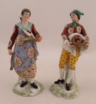 A pair of 19th century Derby figures, one with a lady with fish basket and the other with a basket