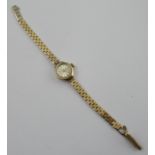 A 9ct 'Avia' ladies watch, the dial with baton numerals, flat link bracelet, weight 12.5g total