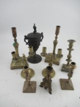 A quantity of 19th and 20th century brass ware, including candlesticks, pans etc