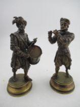 A pair of 19th century continental models, of musicians, signed E. Guillemin to the base, height 9.