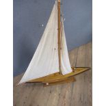 A vintage pond yacht, with stand