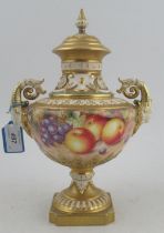 A Royal Worcester covered vase, decorated with hand painted fruit all round by Freeman, shape