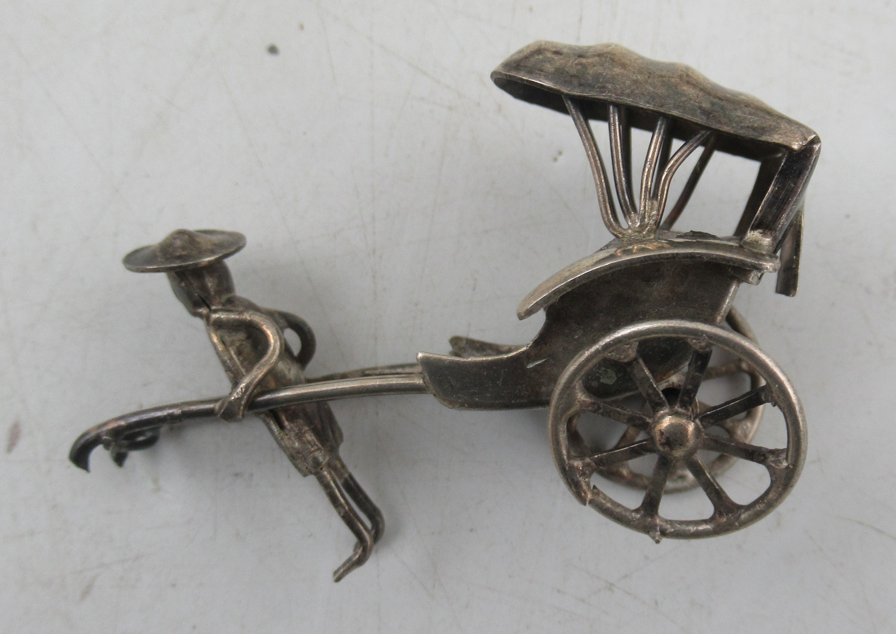 Twelve various white metal miniature Rickshaws with figures, together with a Mexican '925' silver - Image 3 of 4