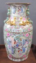 A Chinese famille rose vase, decorated with warriors, court scene, with typical fashion and gilt