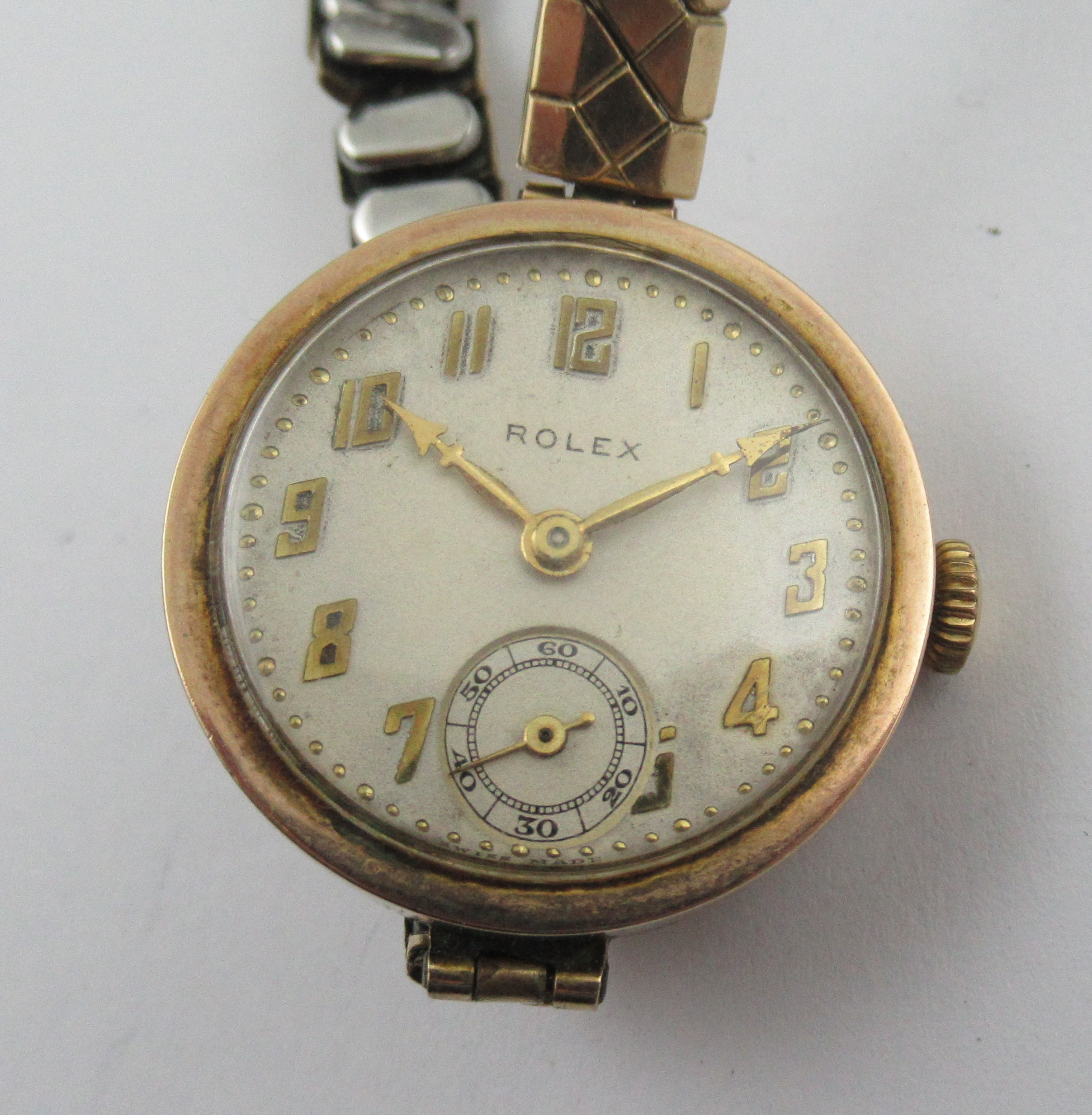 A 9ct vintage Rolex watch, the dial with Arabic numerals and subsidiary seconds dial, on a gilt - Image 2 of 3