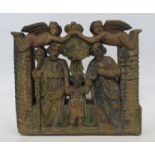 A carved wooden figure group, of mother and child in an arbour, retaining some gilt decoration,