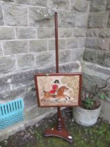 A 19th century mahogany pole scree, the tapestry panel decorated with a hunting scene