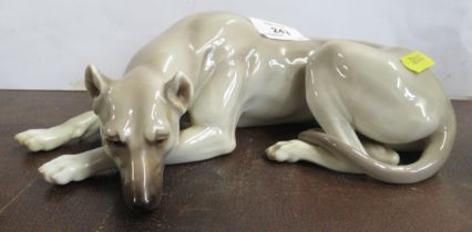 A Nymphenburg model, of a reclining great dane, unmarked but bought as such, length 9ins