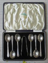 A box of six hallmarked silver tea spoons and sugar tongs