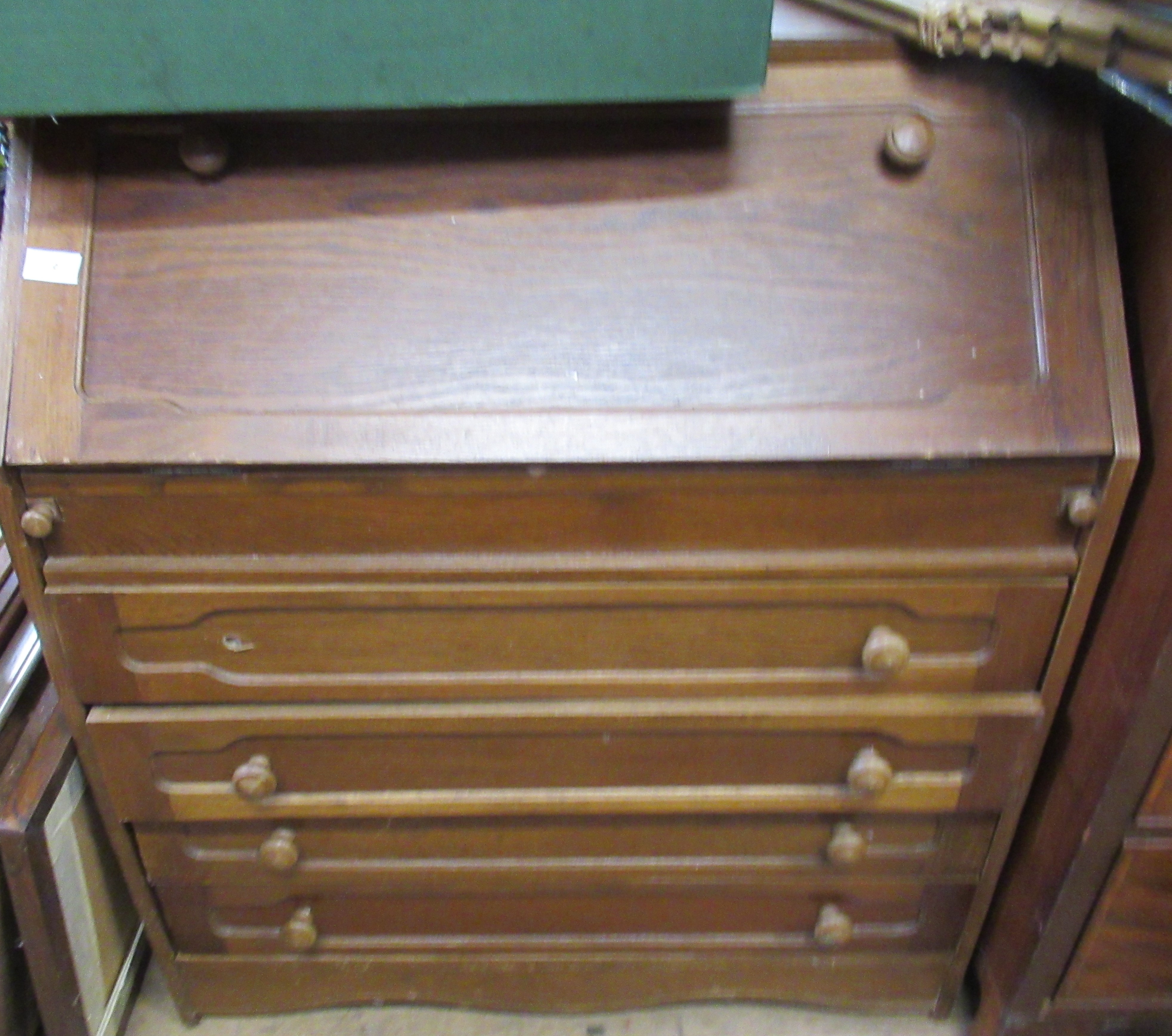 A bureau, wall cabinet, stick stand and coffee table