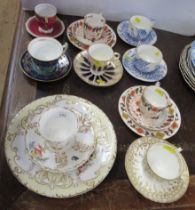 A collection of 19th century and later cups and saucers, including Copeland and Garrett, a pair of