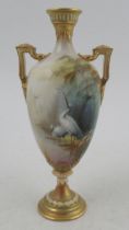 A Royal Worcester pedestal vase, decorated all round with a landscape and stork by Lewis, shape