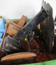 A box of sundries to include book trough, papier mache trays, plate stands etc