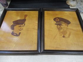 A pair of marquetry inlaid satinwood panels, of the Queen and Prince Philip