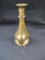 An antique Islamic faceted cast iron brass vase