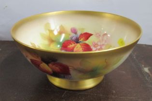 A Royal Worcester bowl, decorated with autumnal flowers, by Kitty Blake, width 9ins Condition