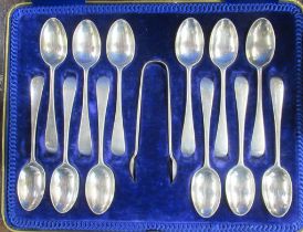 A case set of 12 hallmarked silver spoons and a pair of sugar tongs