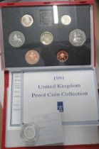 A 1997 silver proof piedfort one pound coin, together with a 1991 United Kingdom proof coin