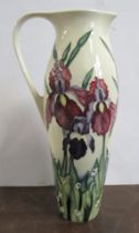 A Moorcroft jug, decorated in the 'Duet' pattern, height 11ins