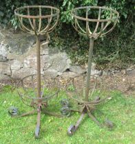 A pair of double metal flower stands, height 38ins