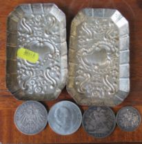 A pair of hallmarked sliver dishes, together with four coins