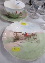 A Royal Doulton trio, decorated with hunting scenes