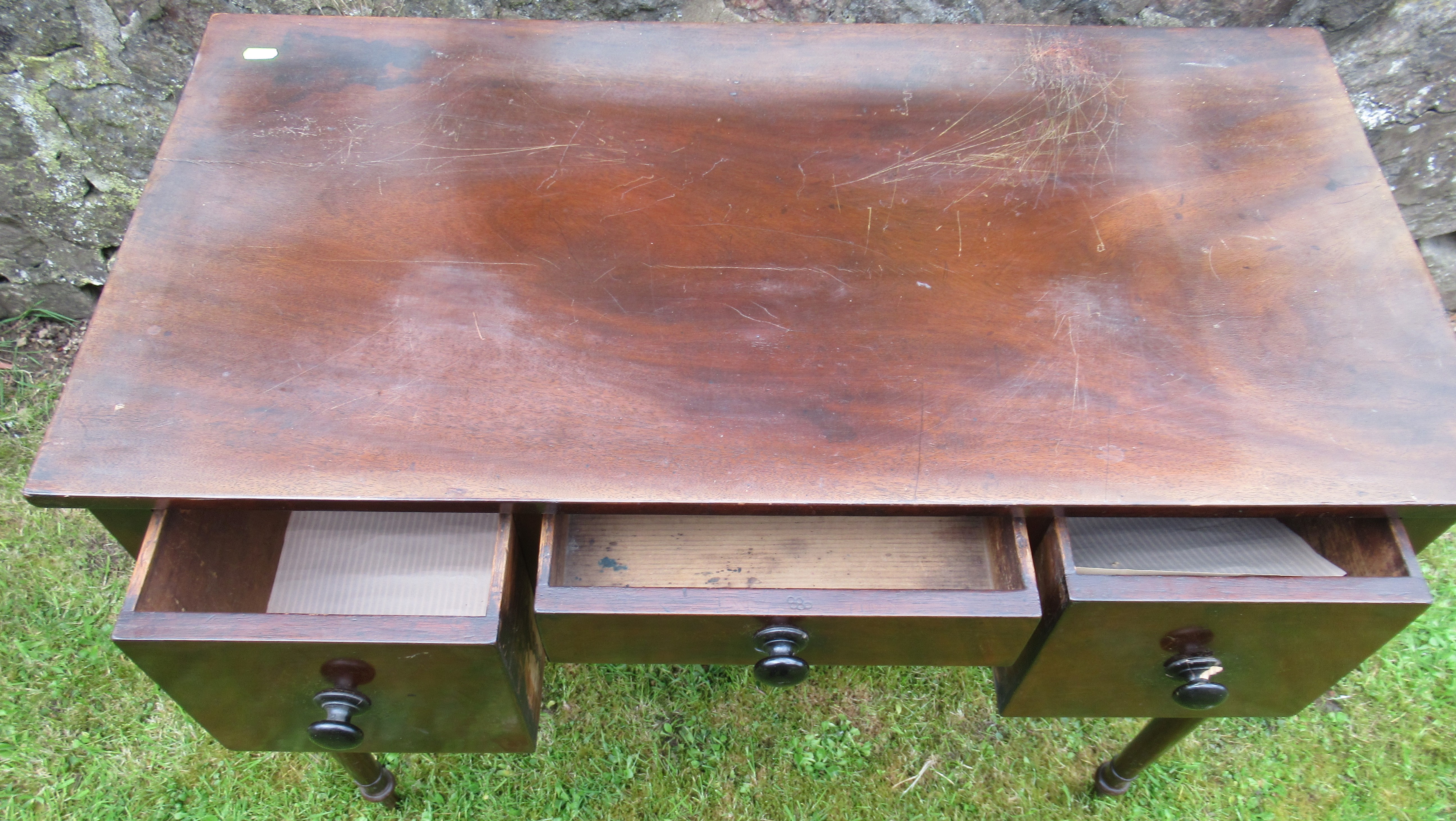 A 19th century mahogany sidetable, fitted with three drawers, on ring turned supports, 36ins x - Image 3 of 3