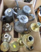 A collection of metal ware, to include brass candlesticks, brass wheel hubs and coffee pots