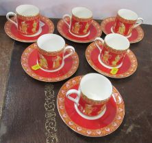 A set of six Wedgwood coffee cans and saucers, decorated with the Musical Muses pattern