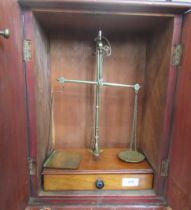 A mahogany cased set of scales , Degrave, London, with weights , height 17ins