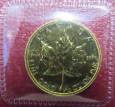 A Queen Elizabeth II 1986 1/10 ounce gold coin