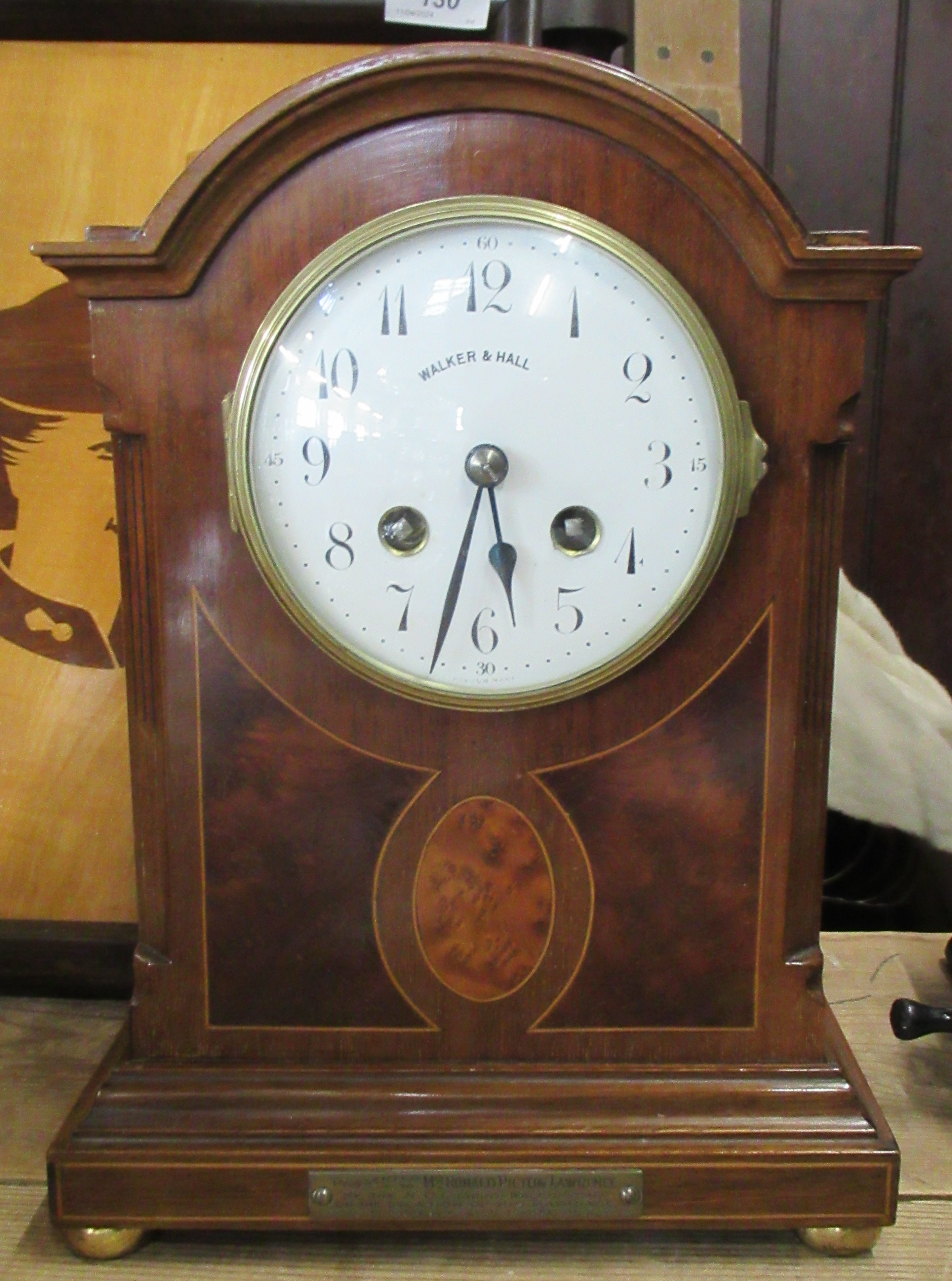 A Walker and Hall mahogany mantle clock, height 11ins