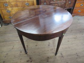 A 19th century mahogany fold over table, width 37ins