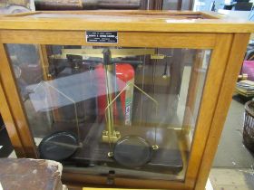 A Griffin and George set of scales in display case, together with a complete boxed set of weights