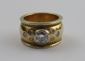 An 18ct yellow gold diamond ring, having central round brilliant cut diamond, estimated 0.45ct and