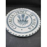A 1969 Rye Pottery Prince of Wales Investiture commemorative plate, together with a Rye Pottery grey