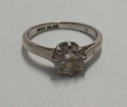 A white metal solitaire diamond ring, approximately 0.5 carat, finger size J, weight 2.4g