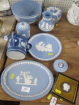 A collection of Wedgewood Jasper ware, including three handled cup decorated with classical figures,