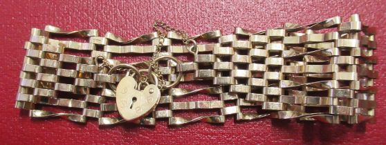 A 9ct gold bracelet, with 9ct gold padlock, total weight 12.9g