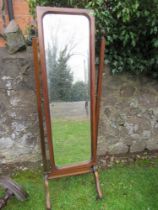 A mahogany framed cheval mirror