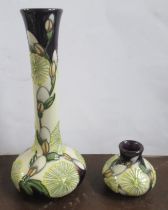 Two Moorcroft vases, decorated in the same pattern, heights 8ins and 2ins